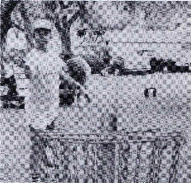 Steve Slasor at a disc golf basket